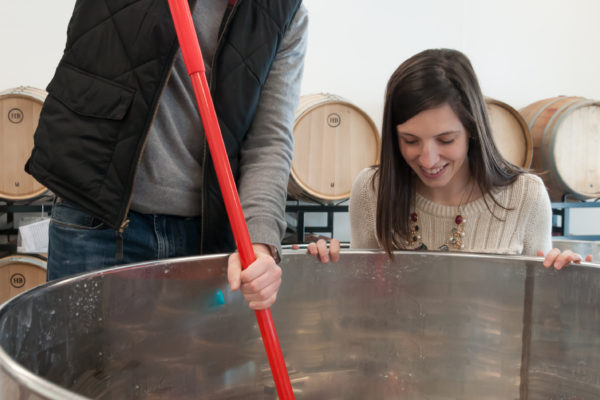 Punching Down Grapes for Wedding Wine