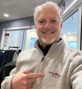 Mark sporting a full-zip Seven Birches Sweater