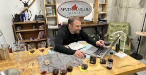 Winemaker at Seven Birches Winery, Blending Wines in Office